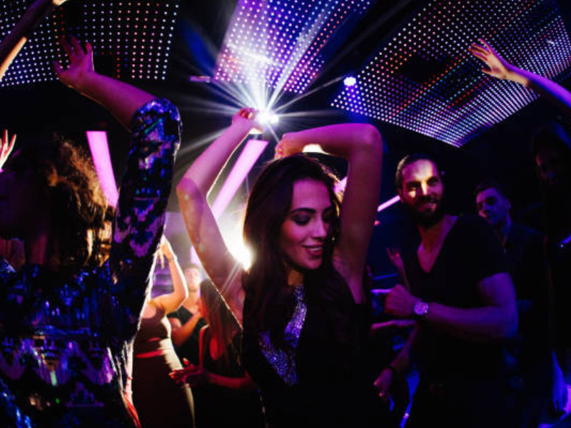 What is a party girl escort enjoying VIP nightlife experience with client